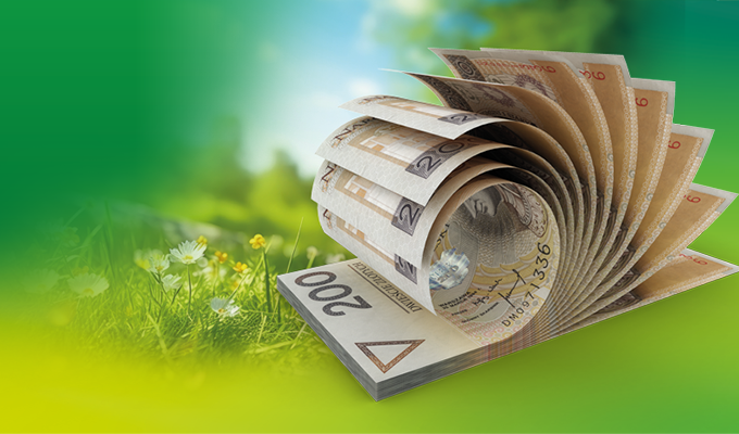 Baner przedstawiajacy plik banknotów 200 złotowych